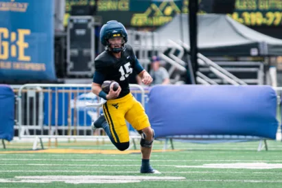 Rich Rodriguez Staying Quiet On Naming WVU's Starting QB, Isn't Opposed To Using Two